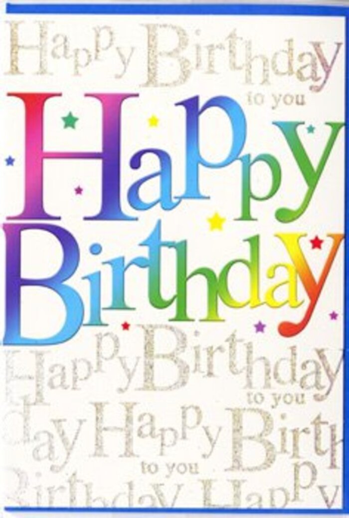 The front of this birthday card is designed like a burst of happiness, the kind you might set beside a vase of fresh flowers in a cosy Oxted living room. At the centre, the phrase Happy Birthday stretches boldly across the card, every letter bathed in a smooth, painterly gradient of colour. The hues glide from celebratory reds and magentas through cool violets and ocean blues, into leafy greens and bright citrus yellows, mirroring the varied tones you'd see in a festive bouquet from a local Oxted florist. The letters are thick, rounded, and confident, as if each one were a balloon or a piece of pastel-coloured candy, offering both visual impact and an inviting softness. Behind this main message, the background is warmed by a repeated script of Happy Birthday to you written in a delicate, looping gold cursive. The metallic ink appears to catch light in a subtle shimmer, echoing the gentle glint of streetlights as evening falls over the town centre. These fine lines of script form a kind of golden tapestry that cradles the bold rainbow lettering, adding depth and a sense of craftsmanship. Scattered between the words are tiny flecks and dots of colour and light, like bits of confetti resting after being tossed in joyful celebration. The overall finish seems silky and refined, with the likelihood of a soft sheen that feels smooth under your fingertips. This card gives the impression of being thoughtfully chosen for someone who loves both bright, modern colour and gracefully traditional detail, an ideal companion to a hand-delivered birthday arrangement anywhere in Oxted.