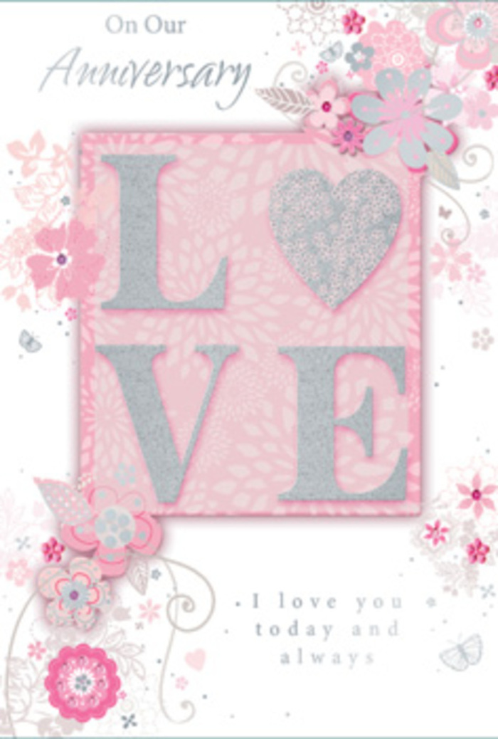The anniversary card shown here carries the atmosphere of a quiet, sunlit morning in Oxted, where love is celebrated in gentle, everyday gestures. At its heart, the word LOVE stands out in bold, raised lettering, coated in a soft, frosted glitter that looks velvety rather than coarse. Each letter reflects light in a subtle way, giving the impression of champagne bubbles or early sunlight against a shop window on Station Road. Surrounding this central motif, a constellation of hand-drawn flowers, leaves, and curving stems cascades across the card's surface. The blooms are delicate and stylised, rendered in harmonious shades of blush pink, muted lilac, pearly white, and touches of silver. Their fine outlines mimic the quick, confident strokes a florist makes while planning a hand-tied anniversary bouquet. The background is a warm, powdery pink that seems to glow softly, fading ever so slightly at the edges to create a dreamy, almost cloud-like effect. Among the petals and foliage, you can find tiny flourishes-whisper-thin tendrils, dainty leaves, and subtly sketched butterflies-that add a feeling of gentle movement, as if the flowers are drifting on a light Surrey breeze. Silver accents highlight certain petals and curves, lending a sophisticated shimmer without overwhelming the design. The printed message, I love you today and always, appears in a refined, understated script that pairs perfectly with the artwork, inviting a moment of reflection. The overall composition feels like a paper translation of a romantic bouquet delivered to a doorstep off Bluehouse Lane, intimate, thoughtful, and made to be cherished long after the anniversary passes.