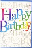This birthday card's design feels like a party captured on paper, the sort of cheerful greeting you can imagine arriving alongside a vibrant bouquet delivered to a doorstep in Oxted. Dominating the front is the phrase Happy Birthday, written in large, playful letters that flow through a seamless gradient of colour, shifting from deep cherry and raspberry reds into rich purples, cool blues, fresh greens, and ending in golden, almost honey-like yellows. The soft blending of tones gives the impression of airbrushed ink or carefully layered watercolour, with each letter glowing as if gently lit from within. Behind this joyful typography, the background is filled with looping lines of metallic gold script, endlessly repeating Happy Birthday to you in a delicate, flowing hand. The gold lettering glints softly, picking up light the way sun reflects off damp pavements near Oxted Station after a light rain, adding a refined shimmer without overwhelming the main text. Small sparkles, dots, and specks of colour are scattered between the curves of the script, suggesting celebratory confetti or the twinkle of fairy lights at a birthday gathering. The overall surface seems sleek and satin-smooth, with the central rainbow letters likely slightly raised to create a gentle tactile contrast. This card balances exuberant colour with an elegant undercurrent, making it suitable for all ages-from a child's party at home to a milestone celebration shared with friends at a local Oxted venue. It feels like a sincere, joyful way to say this day is all about you.